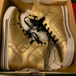 Gold and black Supra’s